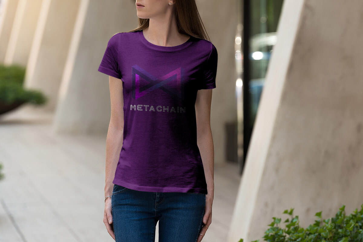 Woman wearing Metachain Tee Shirt outside.
